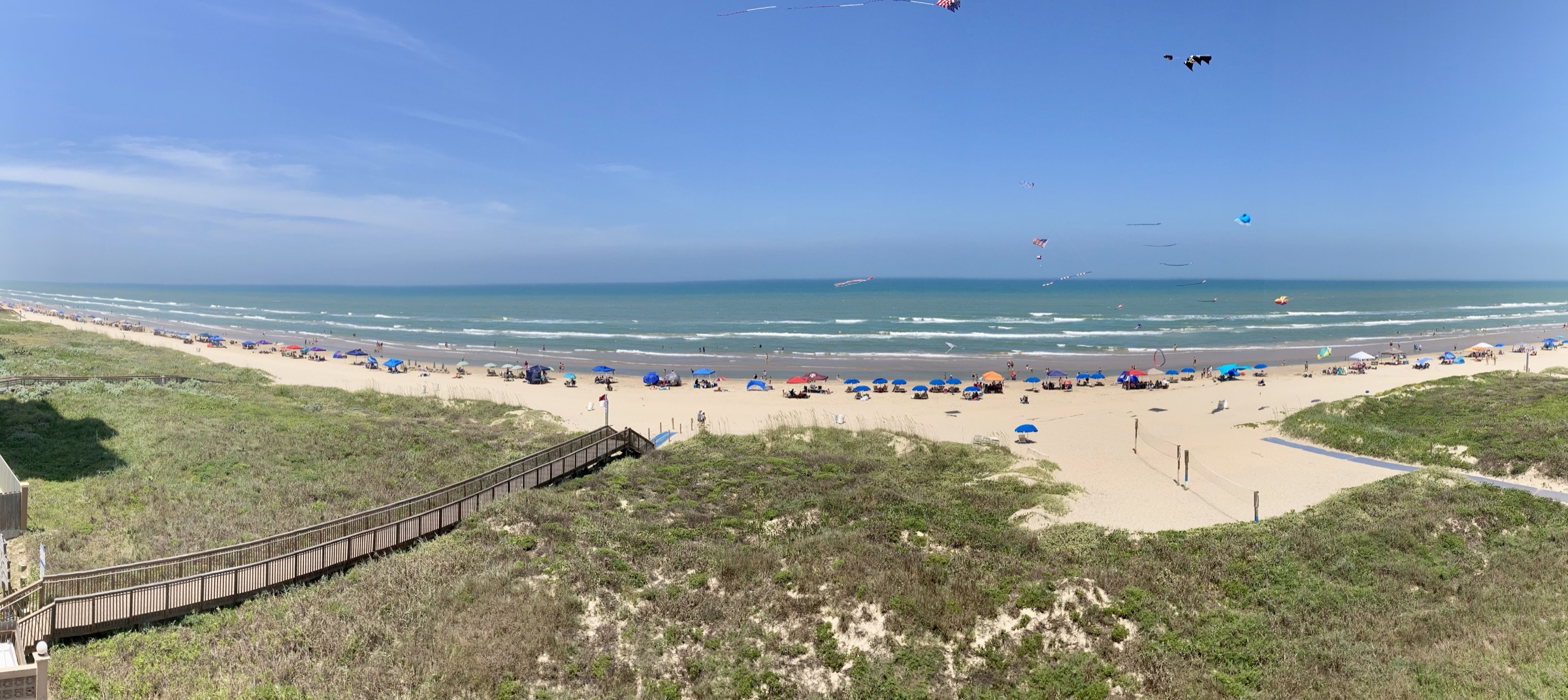Waves roll onto the sandy shoreline of South Padre Island, Texas